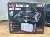 Rechargeable solar wall light model 670 چراغ دیواری خورشیدی شارژی مدل 670